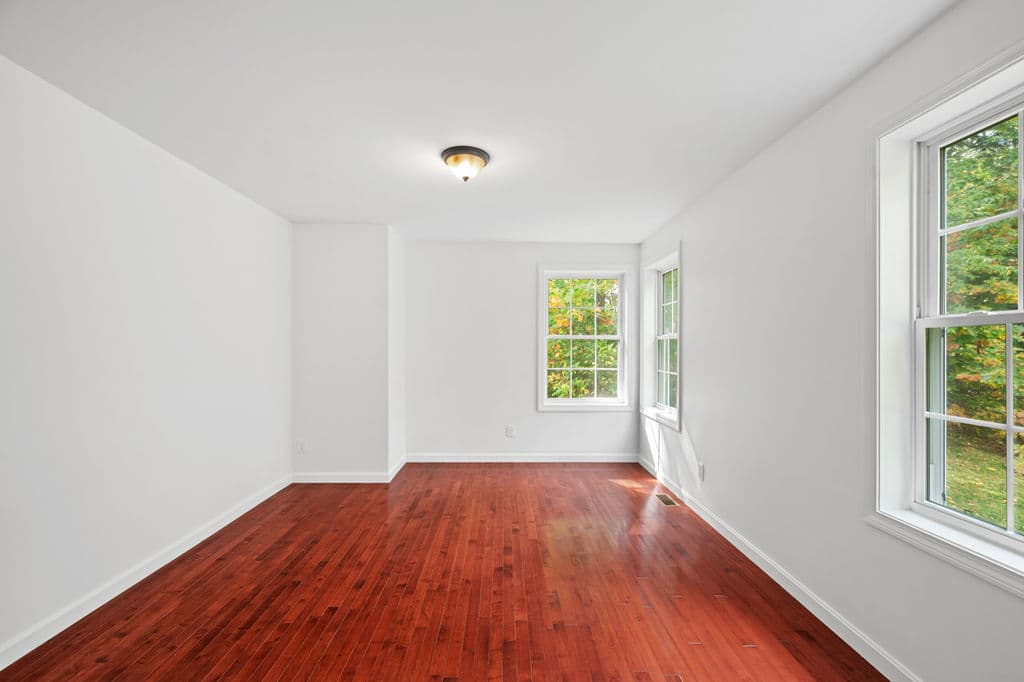 Formal dining room with hardwood floors