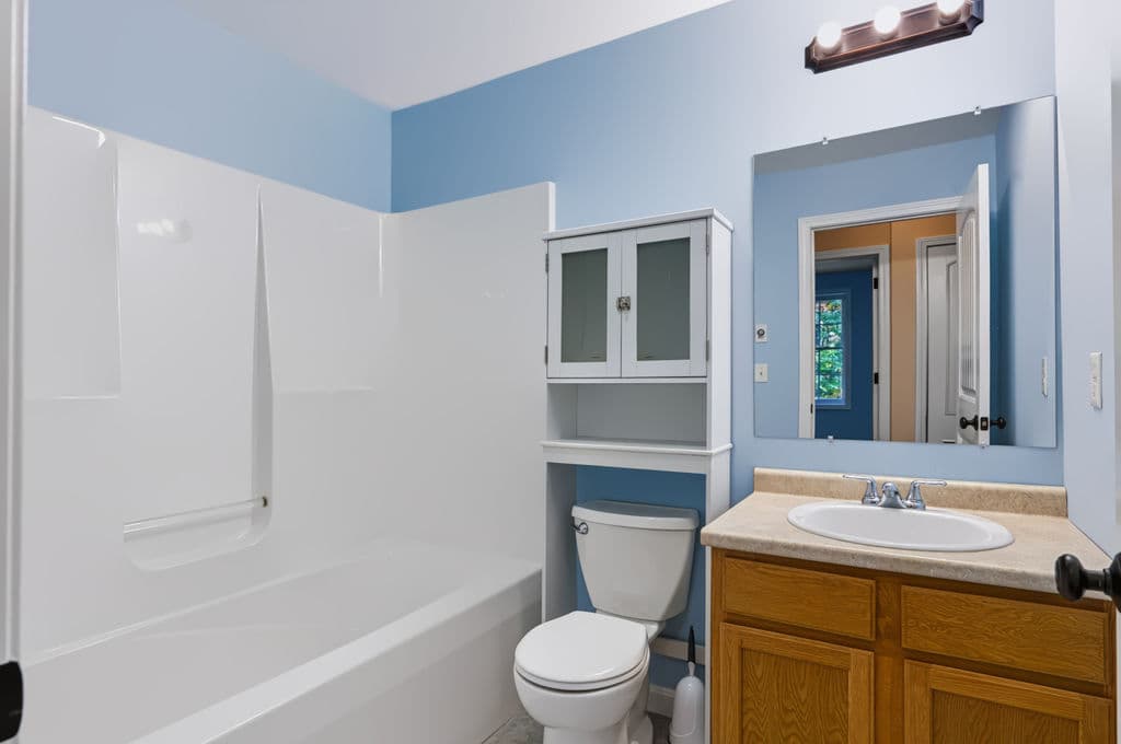 Full bathroom with tub